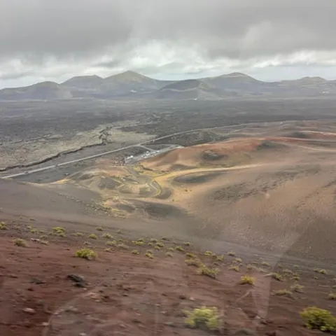Lava plains and cinder cones seen across Timanfaya